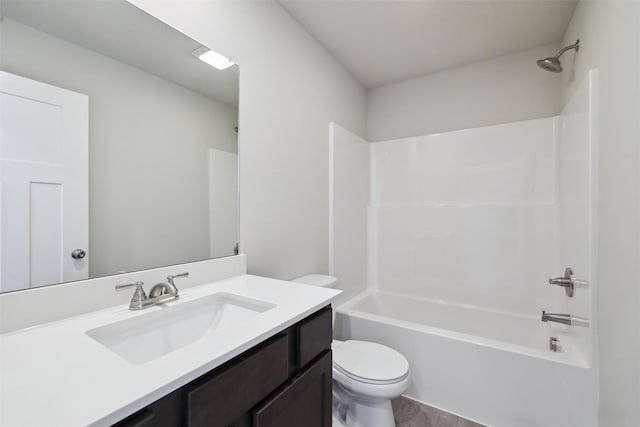 full bathroom with shower / bathtub combination, vanity, and toilet