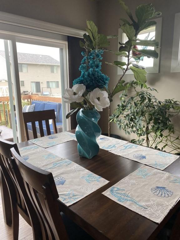 dining space featuring hardwood / wood-style flooring