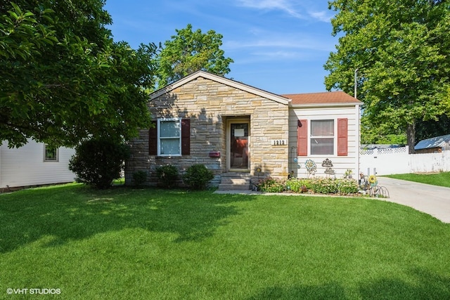 view of front of home with a front lawn