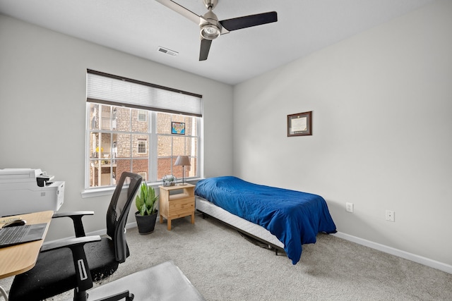 carpeted bedroom featuring ceiling fan