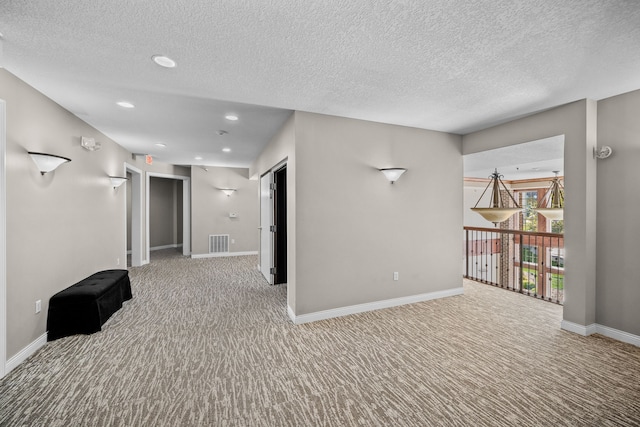 interior space featuring a textured ceiling