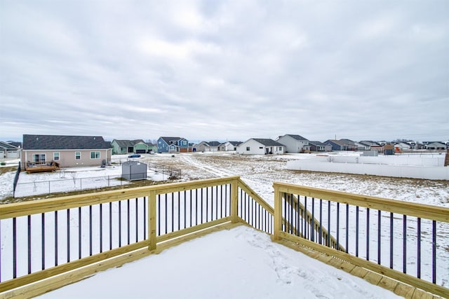 view of snow covered deck