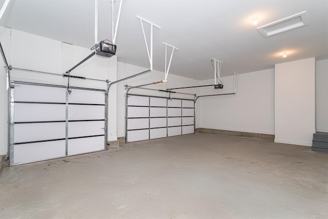 garage featuring a garage door opener