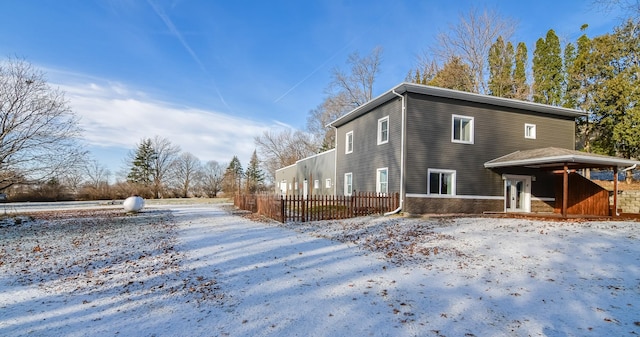 view of snow covered property