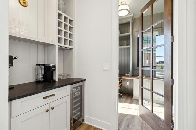 1517 SW Des Moines St, Ankeny, IA 50023 - bar with light wood-type flooring and wine cooler
