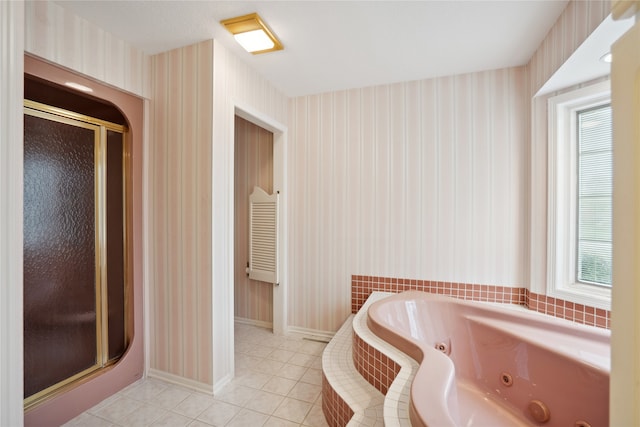 bathroom featuring tile patterned floors and plus walk in shower