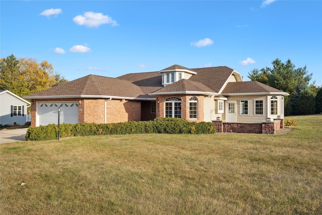 ranch-style house with a front yard and a garage