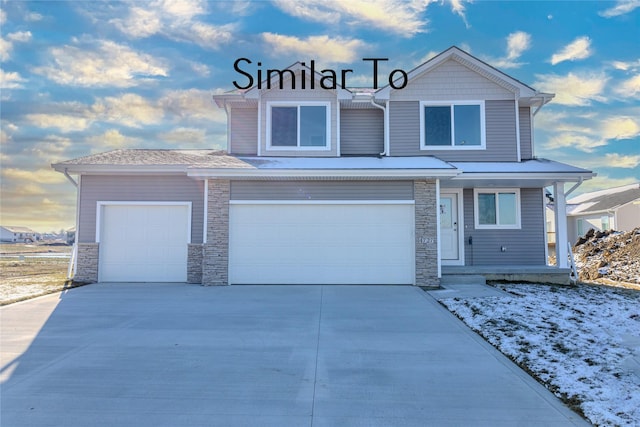 view of front of property with a garage