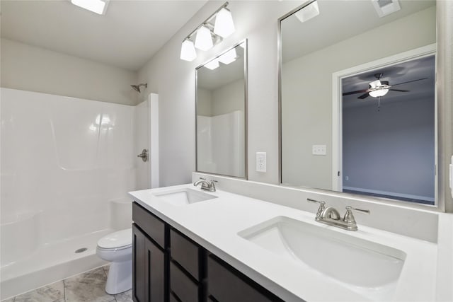 full bathroom with visible vents, walk in shower, and a sink