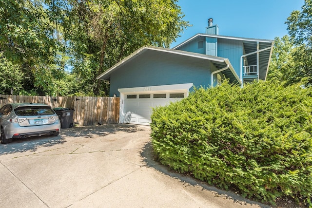 view of side of home with a garage