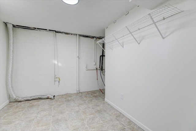 below grade area featuring baseboards