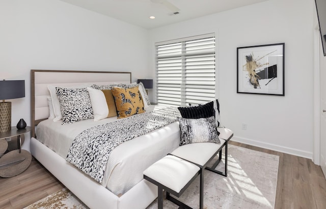 bedroom with light wood-type flooring