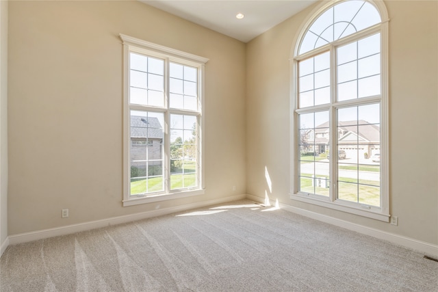 view of carpeted spare room