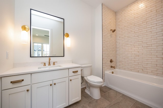 bathroom featuring tub / shower combination, vanity, and toilet