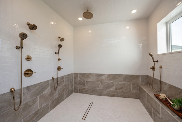 bathroom featuring tiled shower