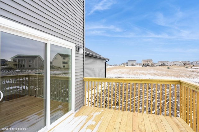 view of snow covered deck