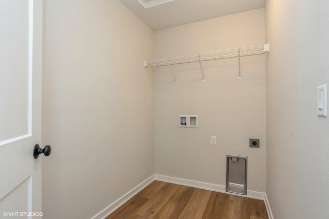 laundry room with electric dryer hookup, washer hookup, and hardwood / wood-style flooring