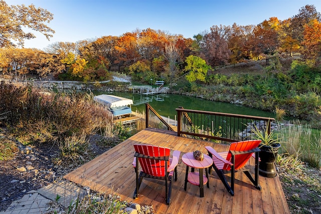 wooden terrace with a water view