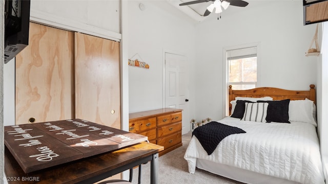 bedroom with ceiling fan and carpet