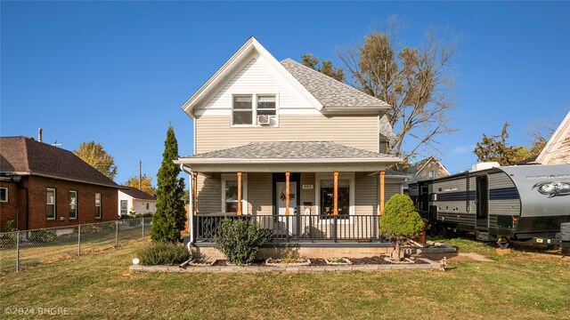803 W Nevada St, Marshalltown, IA 50158 - view of front of house with a porch and a shingled roof
