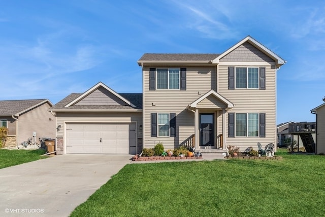 view of front facade featuring a front yard and a garage