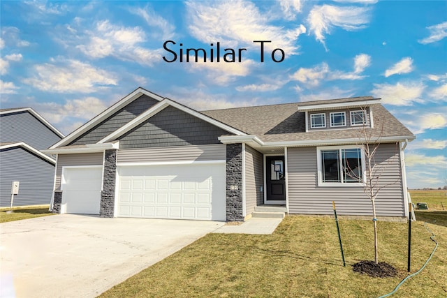 craftsman-style home with a front lawn and a garage