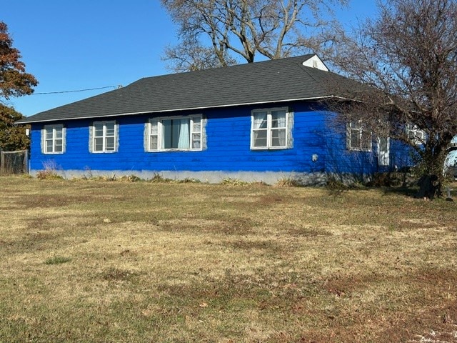 view of home's exterior featuring a lawn