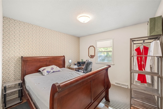 bedroom with a textured ceiling