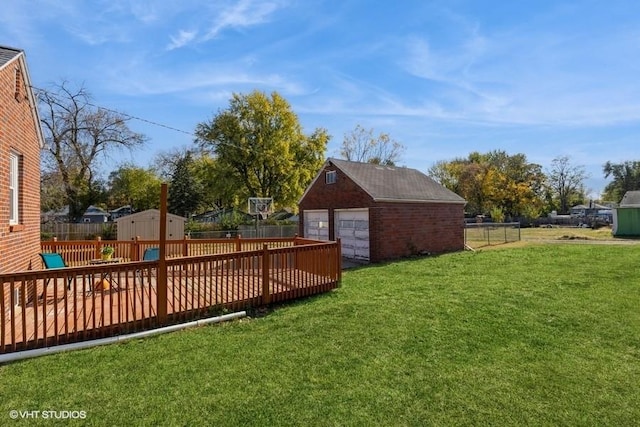 view of yard with a shed and a deck