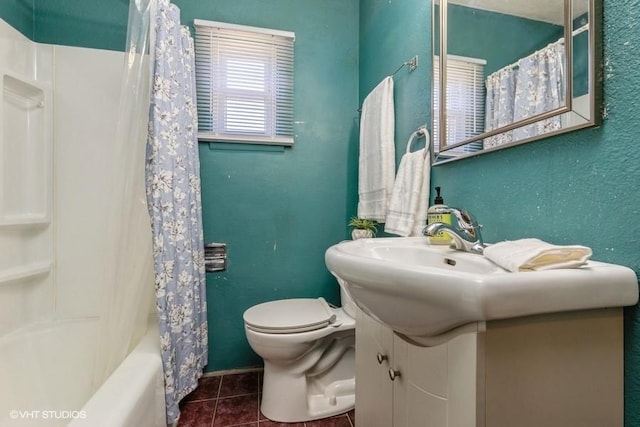 full bathroom with tile patterned flooring, shower / bath combination with curtain, toilet, and vanity