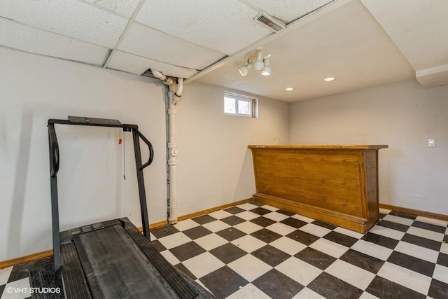 basement with a drop ceiling