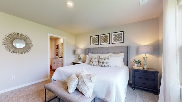 bedroom featuring carpet floors and ensuite bathroom