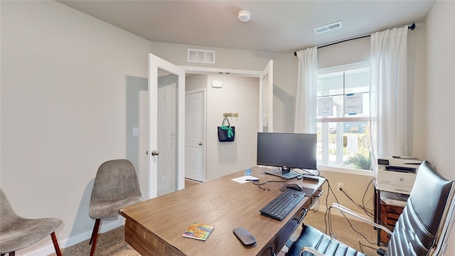 view of carpeted office space