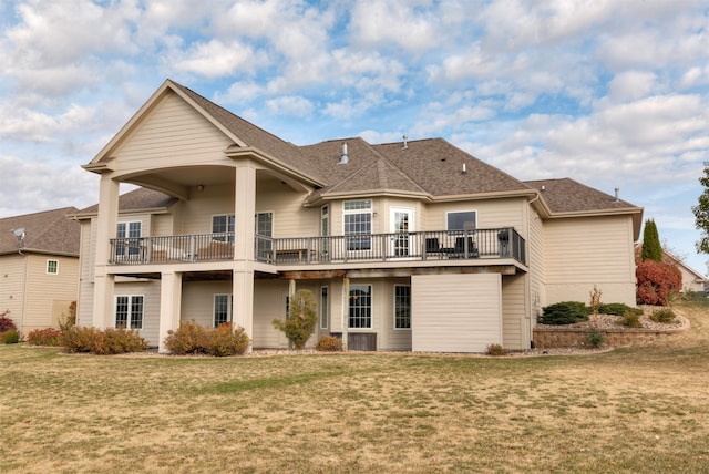 rear view of house with a yard