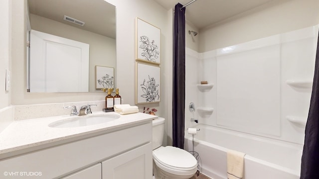 full bathroom featuring toilet, vanity, and shower / bathtub combination with curtain