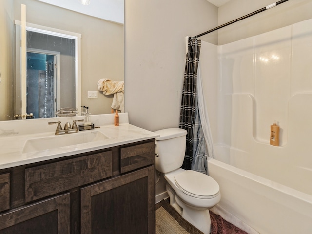 full bathroom featuring toilet, shower / tub combo with curtain, and vanity