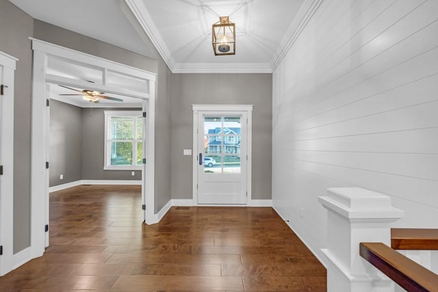 entryway with crown molding, dark hardwood / wood-style floors, and ceiling fan