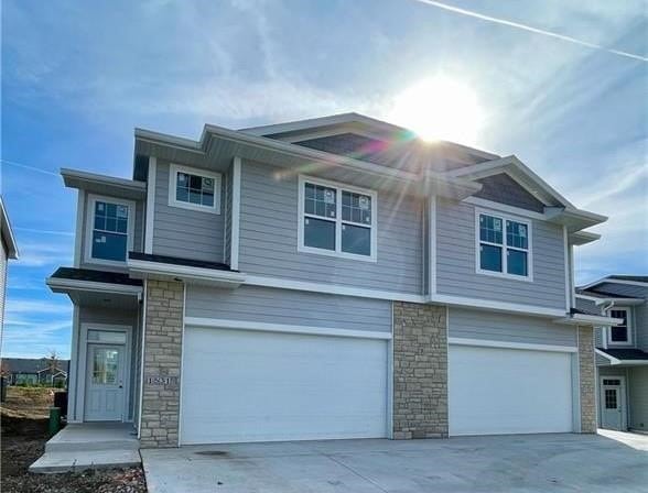 view of front of property featuring a garage