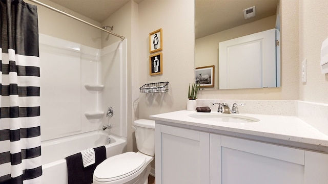 full bathroom with toilet, vanity, and shower / bath combo