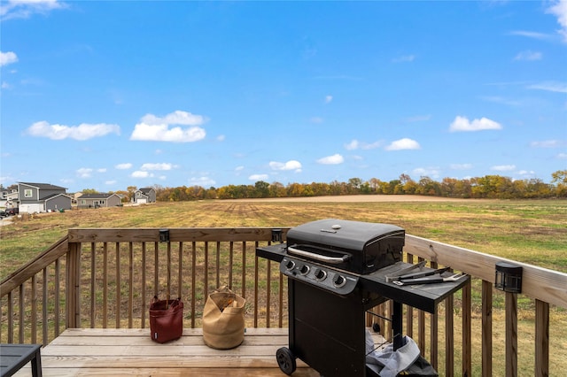 wooden deck featuring grilling area