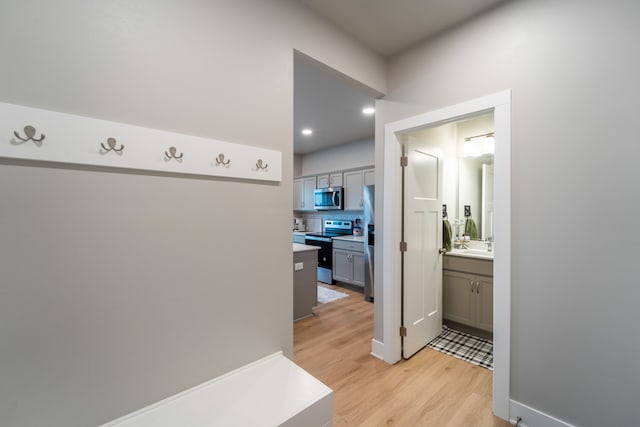 hallway featuring light wood-type flooring