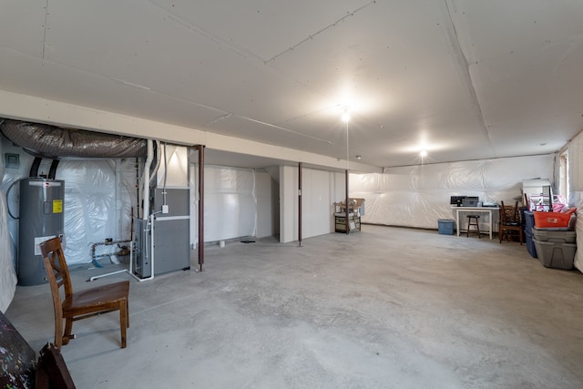 basement with heating unit and water heater