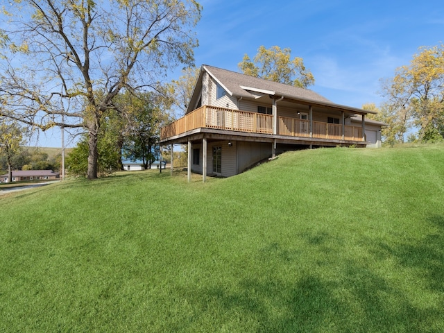 exterior space with a deck and a yard