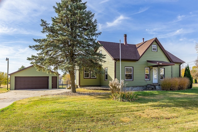 view of front facade with a garage and a front lawn