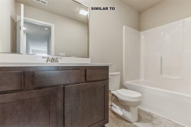 bathroom featuring vanity, shower / tub combination, and toilet