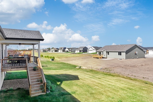 view of yard featuring a wooden deck