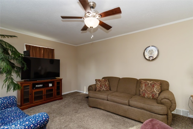 living room with crown molding, carpet, and ceiling fan