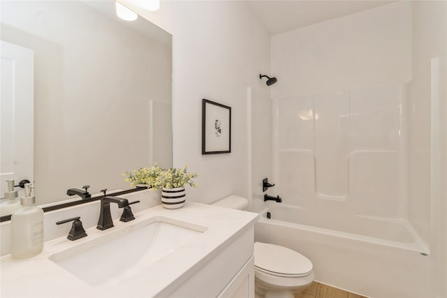 full bathroom featuring vanity, toilet, and shower / bath combination