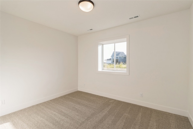 unfurnished room with carpet