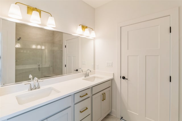 bathroom featuring vanity and a shower with shower door